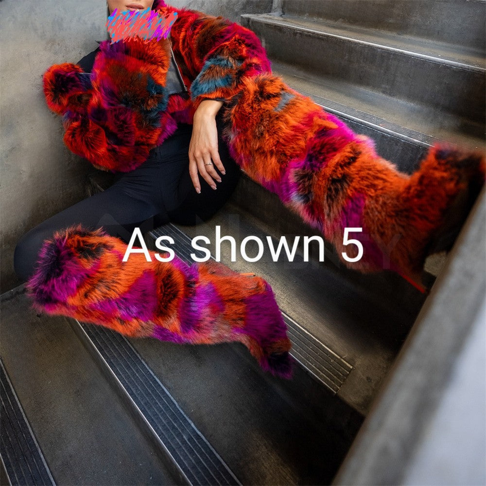 Detailed view of bold and fashionable boots featuring a pointed toe, stiletto heel, and a distinctive patchwork of faux fur in orange, pink, and black