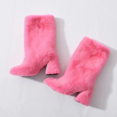 Elegant, knee-high winter boots crafted from plush, with pink mink fur 